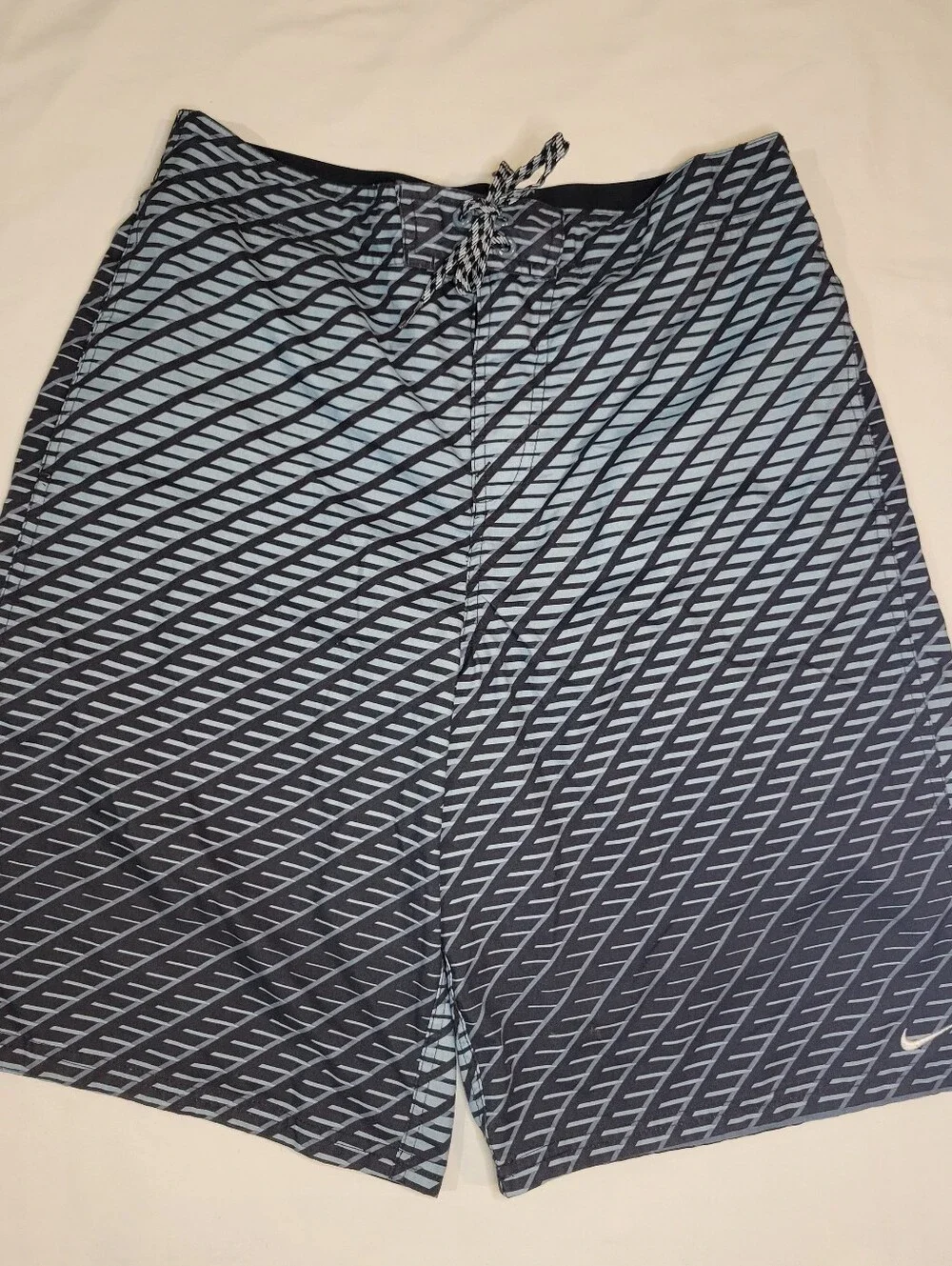 Nike Men's Blue and Black Diagonal Stripe Swim Trunks